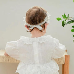 Rannyrena adjustable elastic band headband demonstrates universal sizing