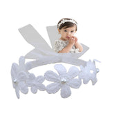 Rannyrena lace-flower-bow-knot-headband close-up showing soft stretch fabric for newborn comfort