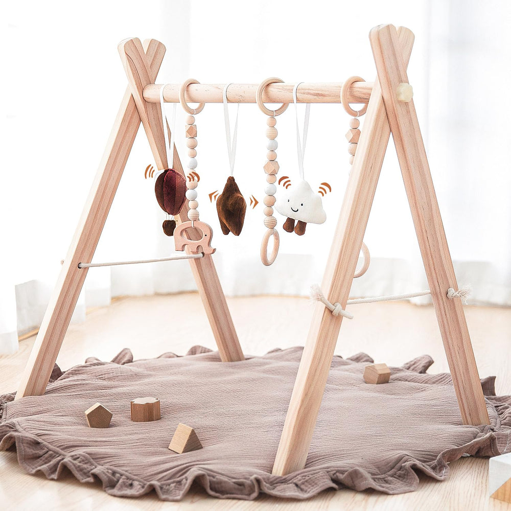 Razee wooden baby play gym frame with a soft mat for cozy tummy time