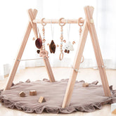 Razee wooden baby play gym frame with a soft mat for cozy tummy time