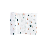 Red Rovr dots-dashes swaddle spread highlighting breathable muslin for daily cuddles.