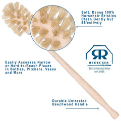 Redecker bottle brush in use on vases, pitchers, and mugs for efficient scrubbing.