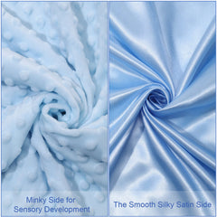Reginary dotted fabric closeup emphasizing breathable gentle surface for snuggle time