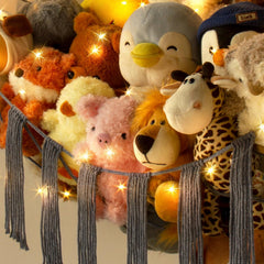 RelaxScene stuffed animal hammock in kids' room decor highlights playful organization.