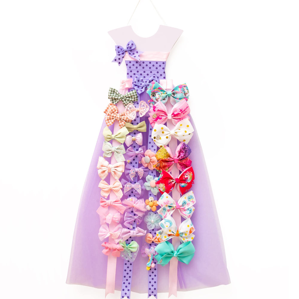 RengaoRise bow holder with princess dress display keeping bows organized and accessible.