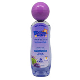 Ricitos de Oro Lavender Baby Shampoo bottle pour demonstrates gentle cleansing for delicate hair.