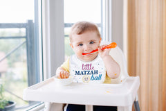 Rite Lite Embellished Bib dress-up at table, a cute, comfortable holiday accessory.