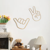 Rmeosye Where the Wild Ones Play sign in natural wood adds rustic charm to kids' playroom.