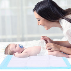Rocinha absorbent underpad with fast-dry surface for mess-free changes.