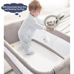 RONBEI bassinet includes music box and toy for soothing sounds and gentle play.