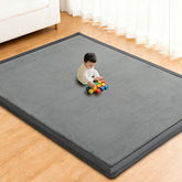 RONGFA baby play mat tummy-time closeup shows ultra-soft coral velvet surface for comfort