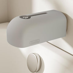 Roslim faucet cover in grey front view demonstrates soft silicone protection during bath