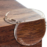 Roving Cove Clear Corner Protector on a furniture corner for child-safe living spaces.