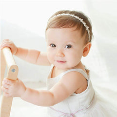 RQJ baby hair accessory elastic back ensures secure fit for active toddlers