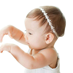 RQJ Christening headband shows pearl detailing for a delicate baby look