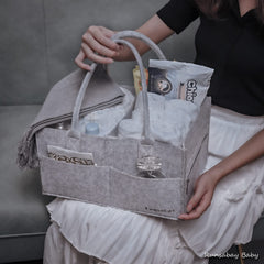 Runsabay diaper caddy on changing table for easy reach.