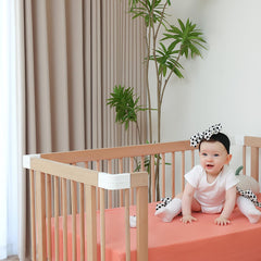 Rutiwa muslin texture close-up—premium fabric for gentle skin-friendly crib bedding.