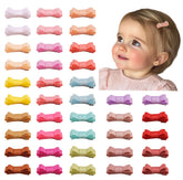 Ruyaa Tiny Hair Bows Snap Clips with soft-material focus for gentle hold on delicate baby hair