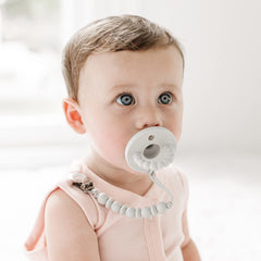 Ryan & Rose Cutie PAT One-Piece Design provides safe, seamless pacifier-teether use.