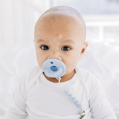 Ryan & Rose Cutie PAT teether handle grip supports easy placement and sore-gum relief