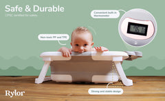 Rylor baby bathtub non-slip base keeps infant secure during bath time.