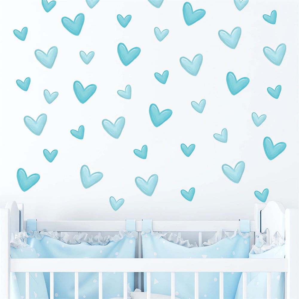 Sacinora blue love heart stickers provide playful nursery decor.