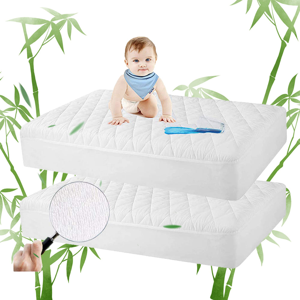 Safe and Sound bamboo crib pad with waterproof backing protects against leaks quietly.