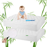 Safe and Sound bamboo crib pad with waterproof backing protects against leaks quietly.