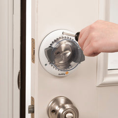 Safety 1st Secure Mount Deadbolt Lock white side installation illustrates behind-hardware mounting.