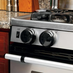 Safety 1st stove knob cover installed on stove demonstrates universal fit