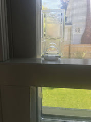 Safety Innovations sliding-door lock shown ready for use to secure a room