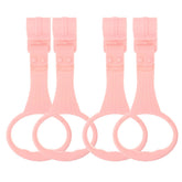 SAFIGLE pink pull-up ring on crib aids early standing exploration.