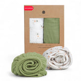 Salt Earth muslin crib sheet with green star design offers snug fit and breathable comfort.
