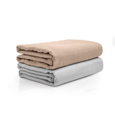 Salt Earth swaddle blanket breathable gauze closeup highlights airy organic cotton for baby's comfort.