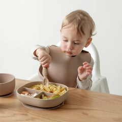 SAMiGO chewable spoon close-up highlights gum-soothing ridges and grip-friendly design