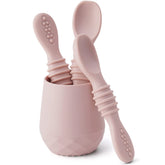 SAMiGO chewable spoon scooping with comfortable grip to assist early self-feeding.
