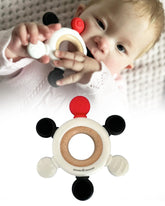 Samuel Sensory teether ring red close-up supports tactile and visual exploration.