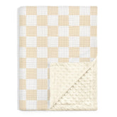 SANDJEST checkered baby blanket with muslin side offers breathable comfort for naps.
