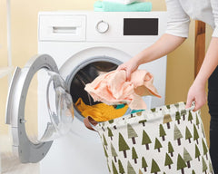 Sanjiaofen tree-pattern collapsible bin demonstrates space-saving design for easy storage.
