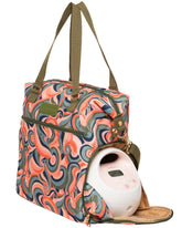 Sarah Wells Lizzy breast pump bag front view shows organized compartments for pumped milk