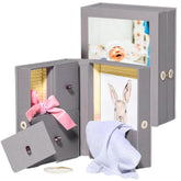 Savor Small Baby Story Box frame closeup highlights durable linen display.
