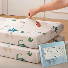 SDY Jersey Dinosaur crib sheets 2-pack laid flat for cozy sleep