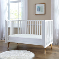 SEALY BABY waterproof barrier closeup highlights moisture protection for crib and toddler beds.