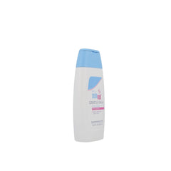 Sebamed Baby Wash Extra Soft bottle pour demonstrates easy bath-time lather for delicate skin.