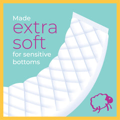 Select Kids Sposie booster pads being inserted into a diaper for night use