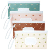Seposeve on-the-go wipe dispenser with green eyes-pattern, clip-ready for stroller outings.