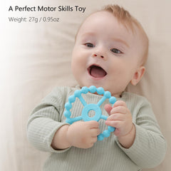 Seposeve teether with pacifier clip attachment keeps toys clean and secure.