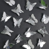 Seyal 3D butterfly wall decor silver closeup adds shimmering elegance for party backdrops.