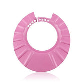 Shuiniba pink baby cap shields eyes during bath time for a calmer wash