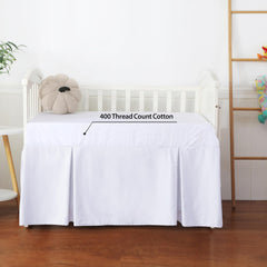 Shunjie.Home dust-ruffle detail adds decorative nursery charm.
